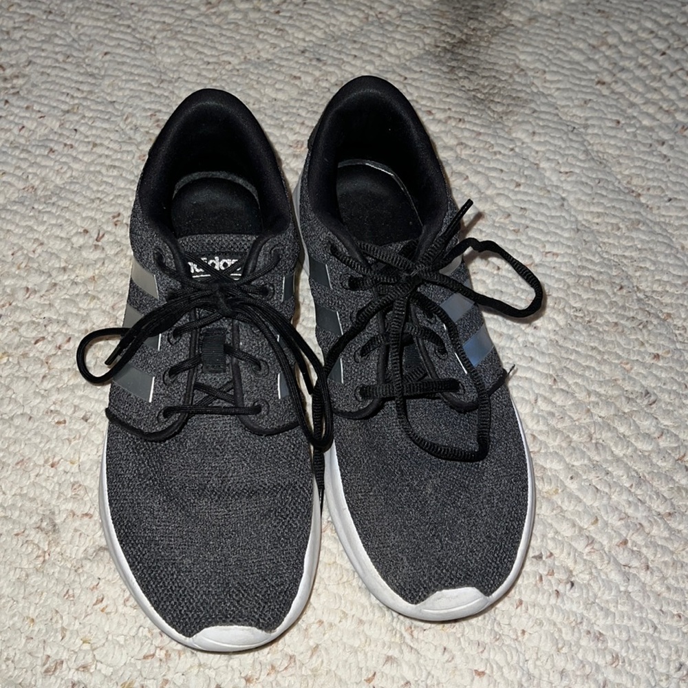 Black and grey adidas tennis shoes